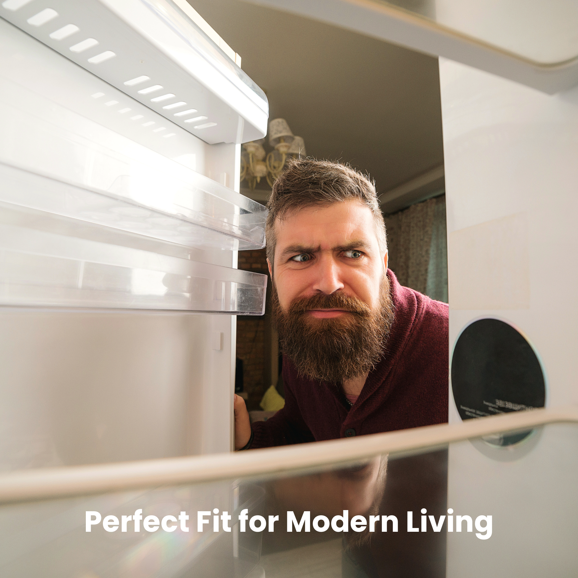 Man peeking into an open refrigerator with text 'Perfect Fit for Modern Living'.